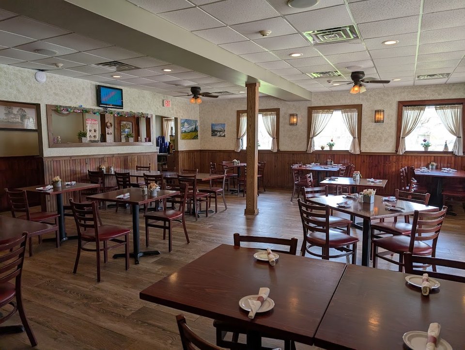 Casual dining room with table seating.