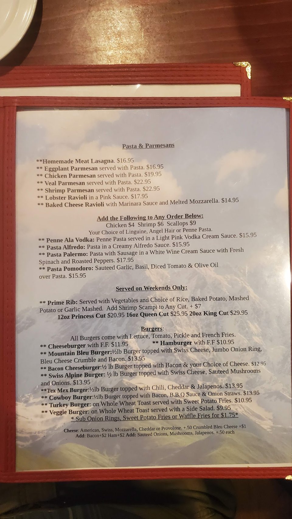 Printed menu showing heroes and platters.